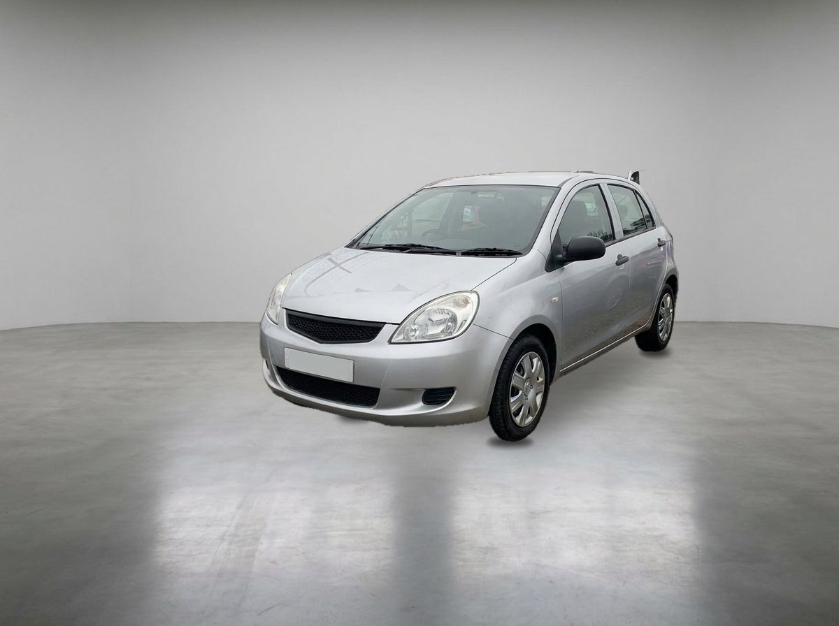 The same silver hatchback in a light showroom